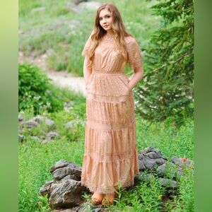 Brand new shimmery polka dot dress! Picture of how it looks on in slide 2.